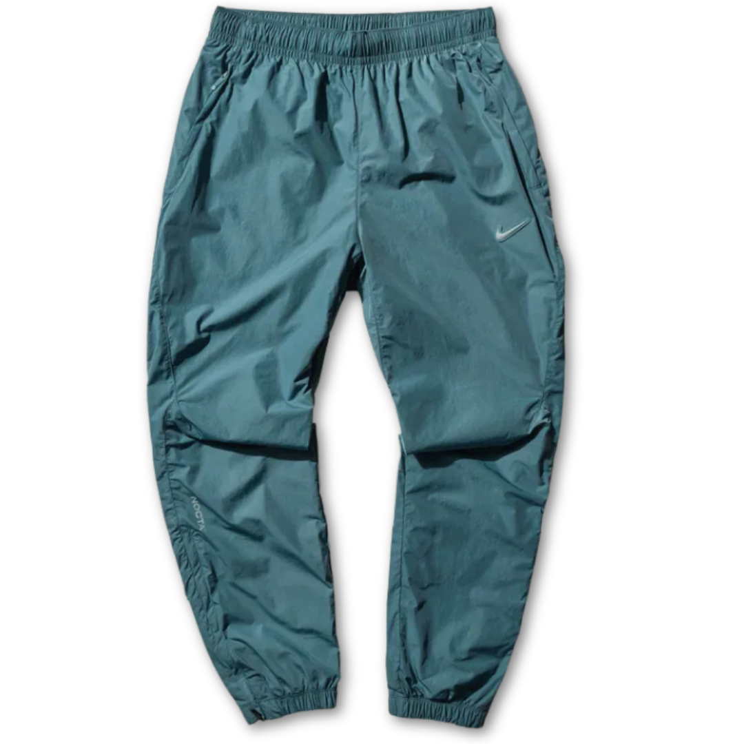 NIKE X DRAKE NOCTA NYLON TURQUOISE TRACK PANT NIKE X DRAKE NOCTA NYLON TURQUOISE TRACK PANT